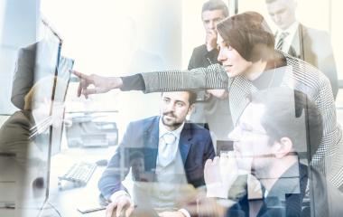 Group of people looking at the screen